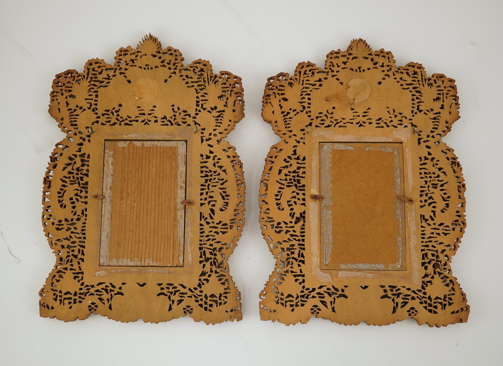 A pair of Chinese carved sandalwood frames, late 19th century